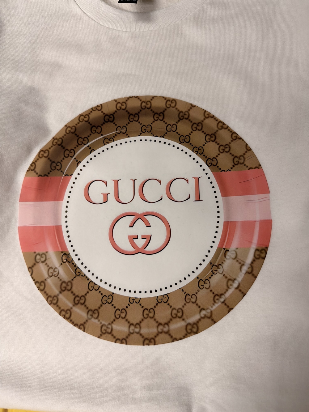 White Tee with Pink and Brown Logo Plate Graphic